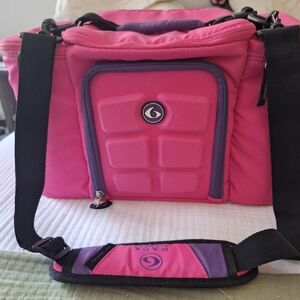 6 Pack Fitness. Insulated Hot Pink Baby Bag with Purple Trim and Black Strap.